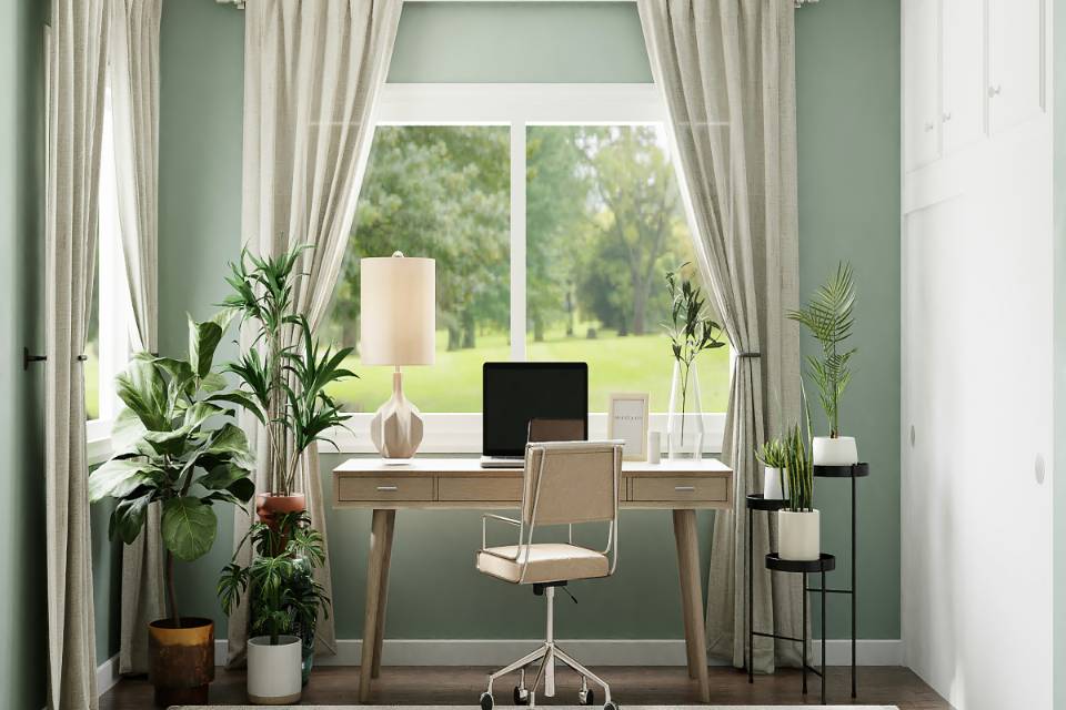 dark wood look flooring in home office with wood desk and plants.